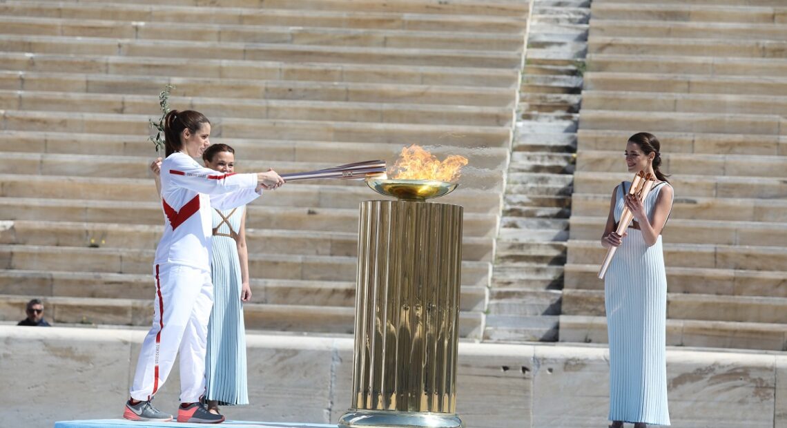 The Olympic Flame Goes From Athens To Tokyo